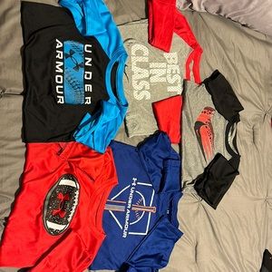 Nike and Under Armour long sleeve boys shirts. 100% polyester
